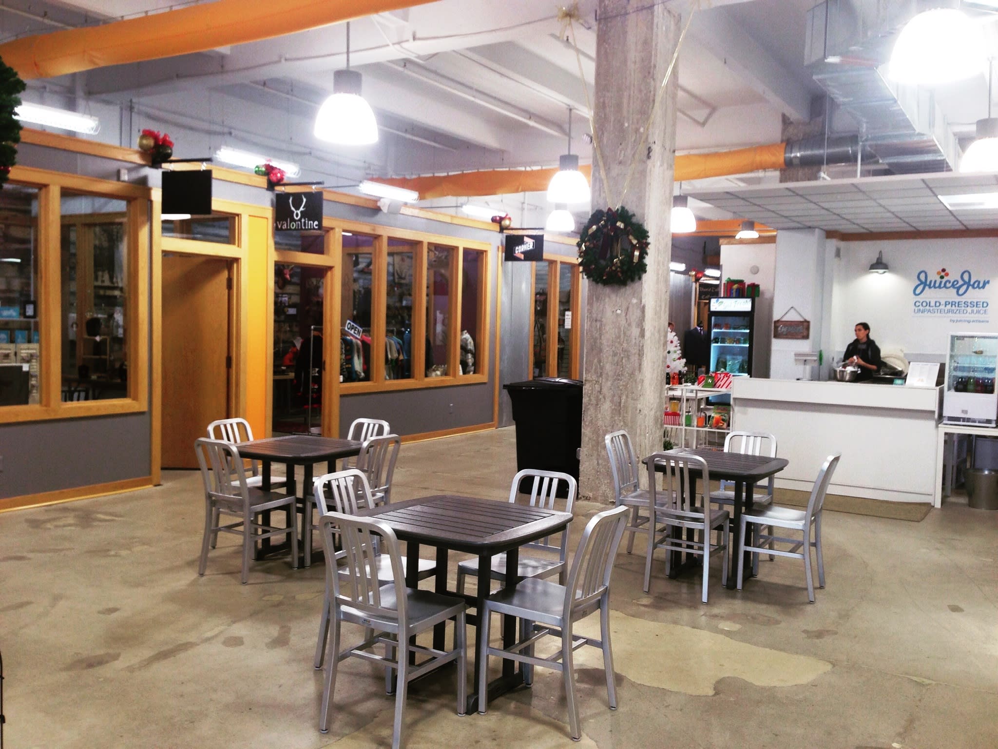 Walking into The City Exchange Shops, you're greeted with tables to sit, Juice Jar to Sip, and boutiques to shop in.