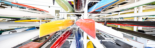 Image of Regatta Boats at the Devon Boathouse at the Oklahoma River in the Boathouse District.