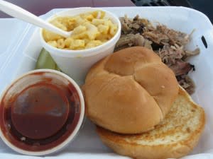 Pulled Pork Barbecue sandwich with a side of macaroni and cheese