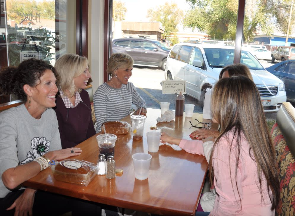Family and friends eat together at Molly's 