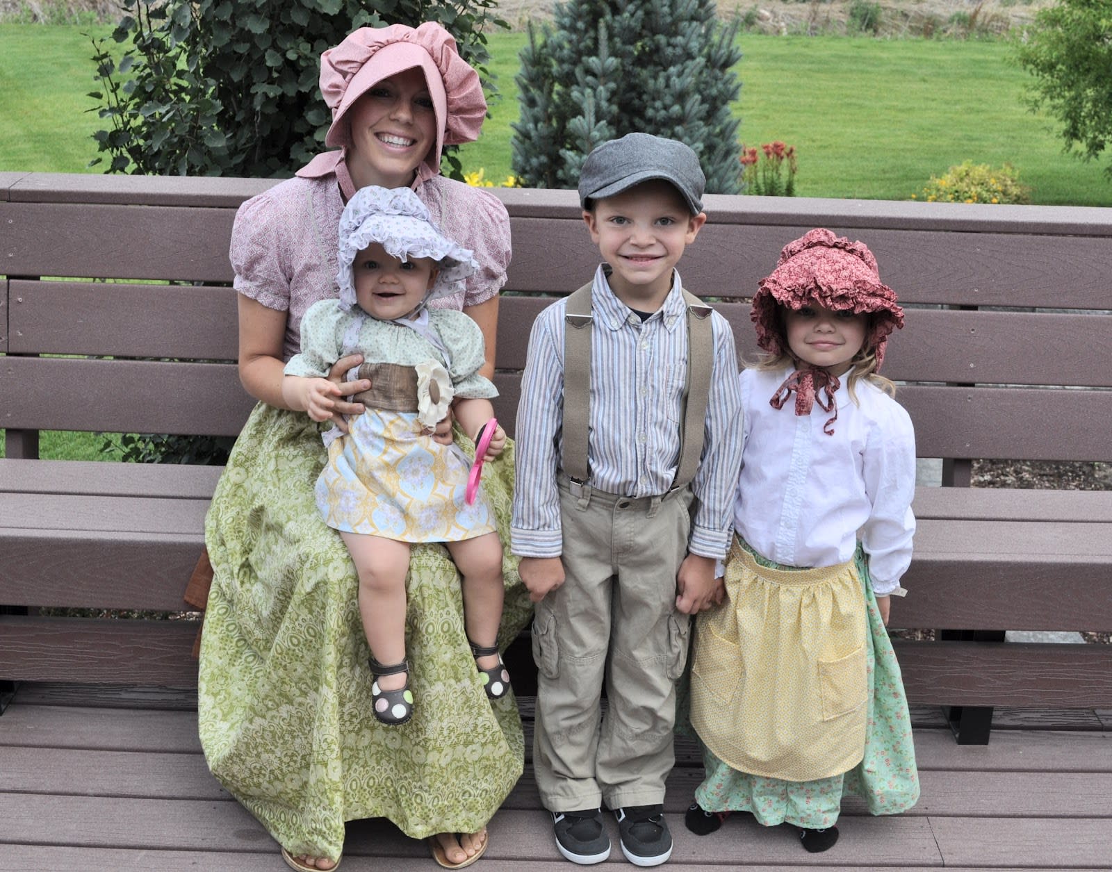 Family dressed up as pioneers