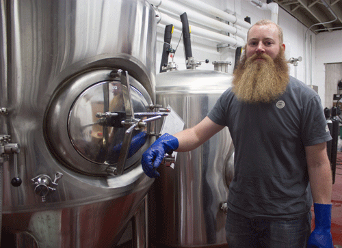 Brewer and co-owner Torrey Lattin standing in his brewery in Wichita, Kansas.