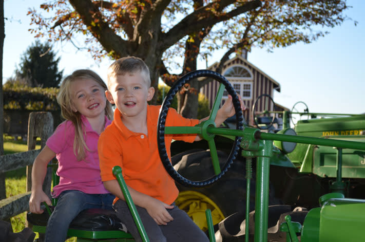 Savannah and Brett Barron aboard Northern Star Farm's tractor. Savannah and Brett Barron aboard Northern Star Farm's tractor.