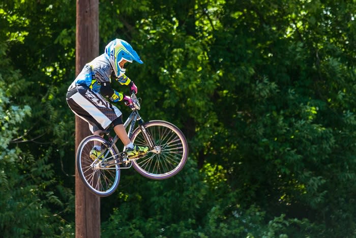 bike trick with greenery
