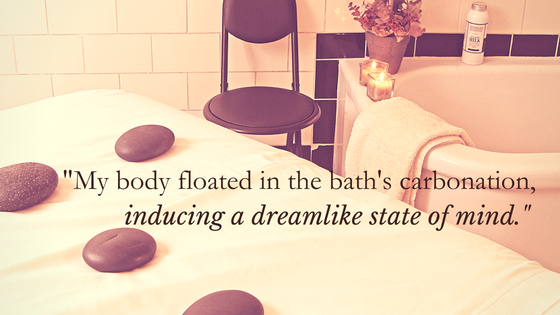 "My body floated in the bath's carbonation, inducing a dreamlike state of mind." over image of Roosevelt Bath & Spa room