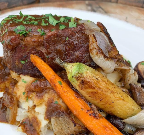 Whiskey-braised short ribs from Whiskey Cake in Irving, TX