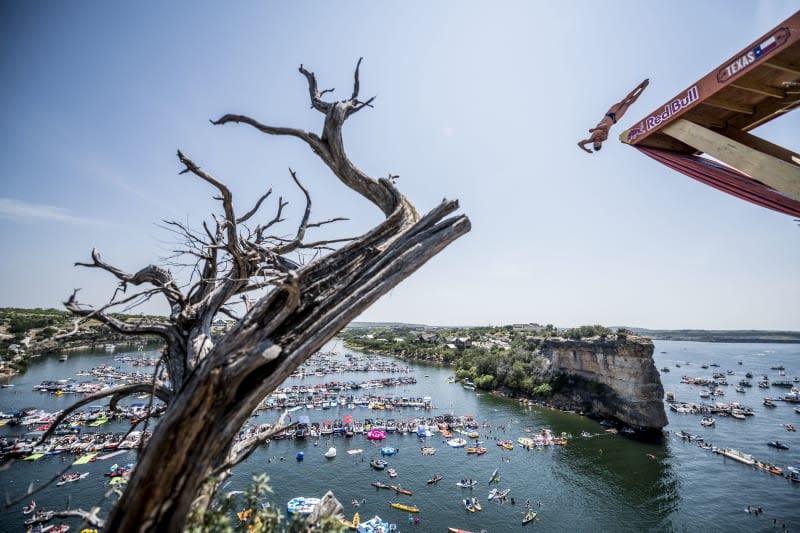 TEXAS, USA - JUNE 2: (EDITORIAL USE ONLY) In this handout image provided by Red Bull, David Colturi of the USA dives from the 27 metre platform during the final competition day of the first stop at the Red Bull Cliff Diving World Series on June 2, 2018 at Possum Kingdom Lake, Texas, USA. (Photo by Dean Treml/Red Bull via Getty Images)
