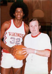 Everyone knows Magic, pictured here in his roots as an Everett Viking. Coach George Fox, pictured here, is in the Hall of Fame too!