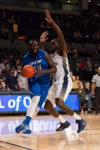 Senior Steve Forbes (54) is a returning starter on the IPFW men's basketball team. (Photo by Clyde Click).