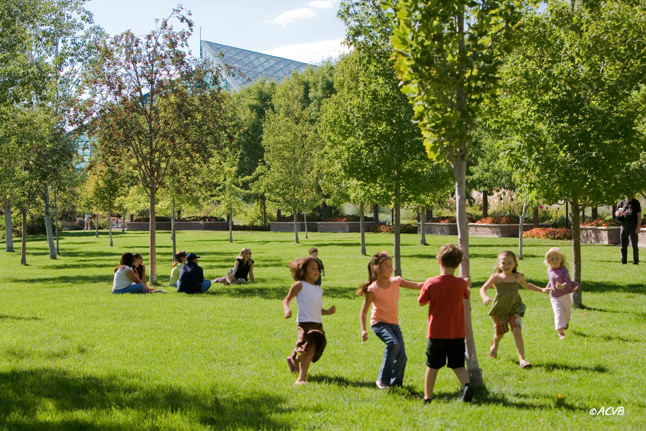 Children playing at the Botanic Gardens in Albuquerque, New Mexico Children playing at the Botanic Gardens in Albuquerque, New Mexico