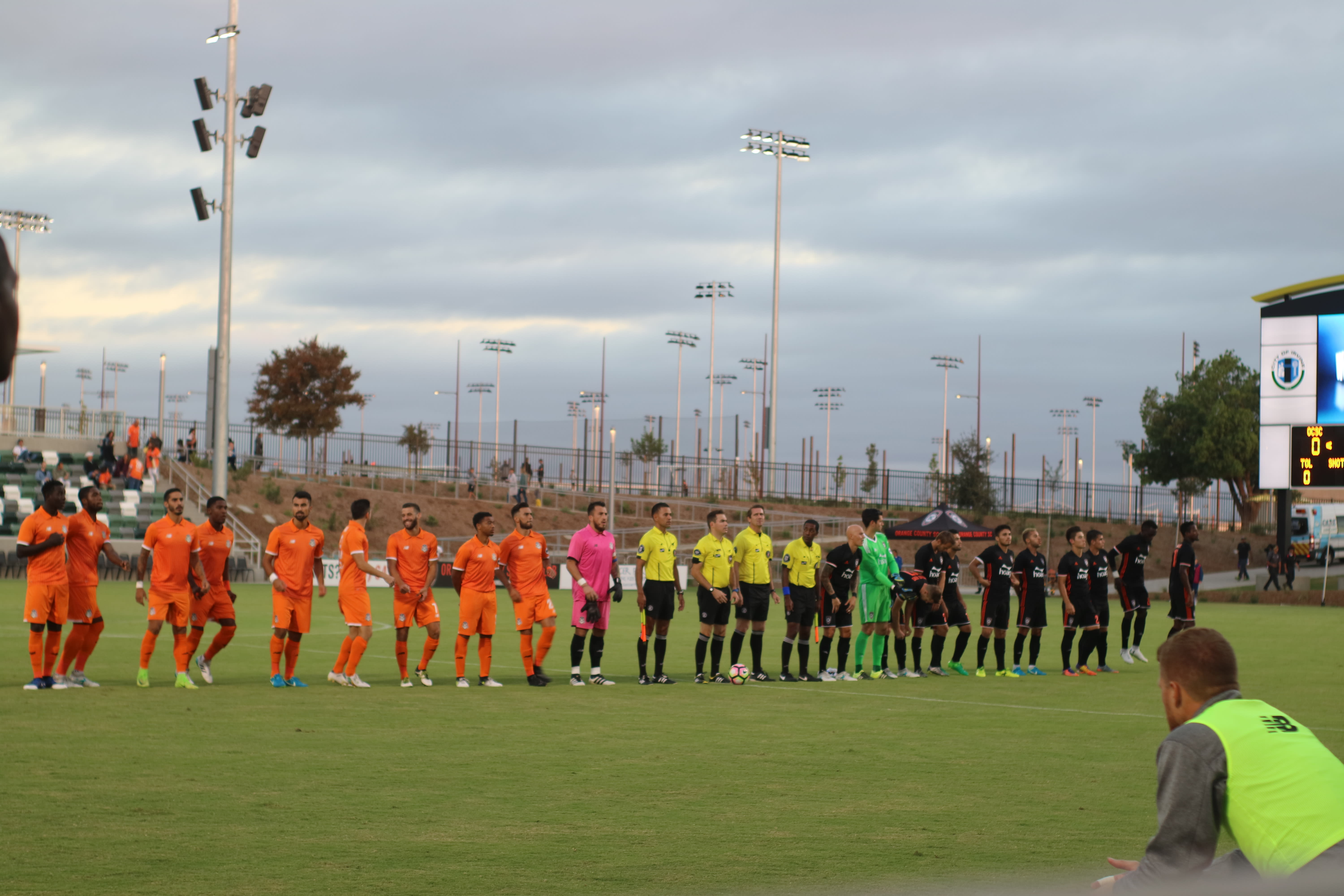 Soccer teams lined up on the Field