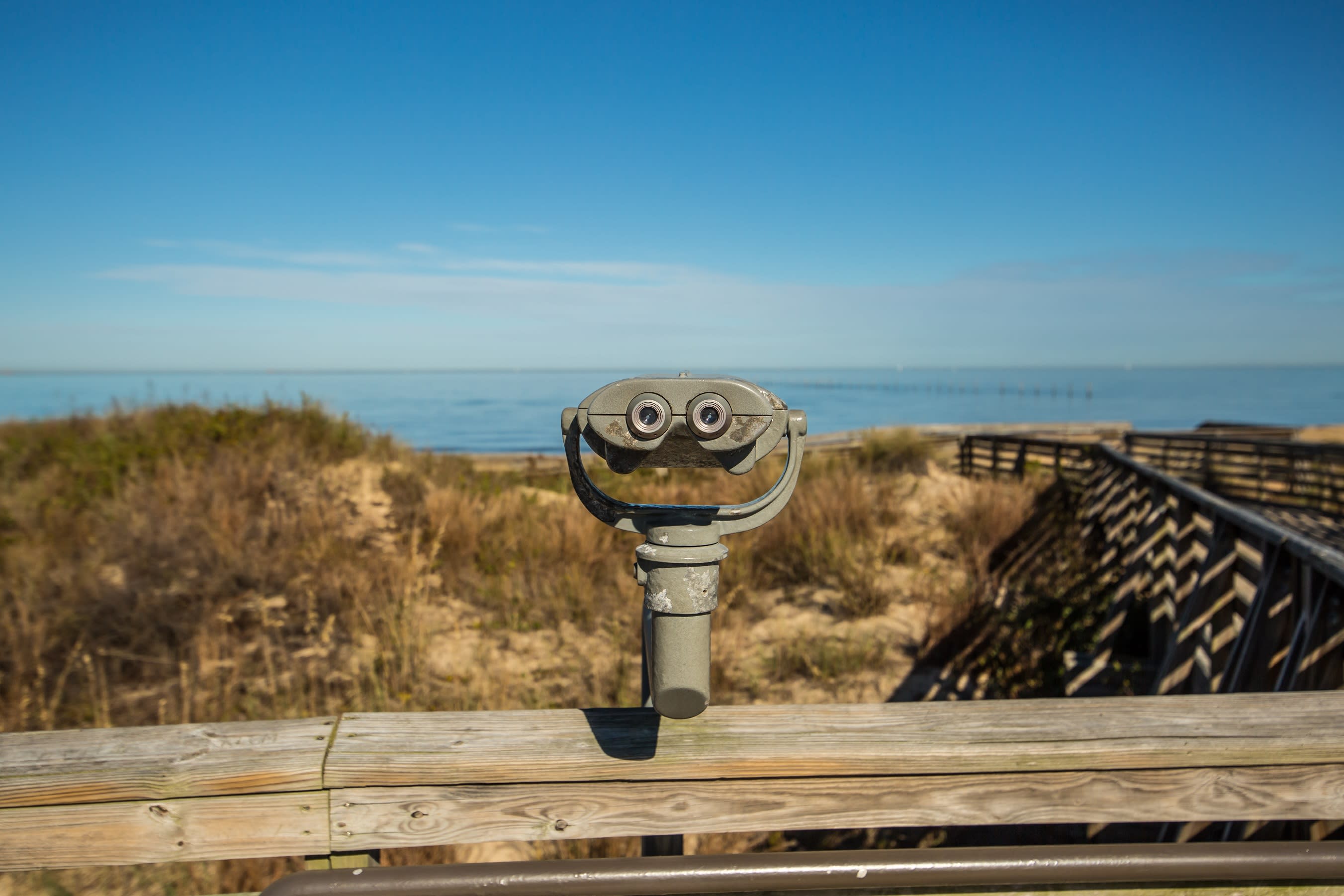 Binoculars Looking Out Over The Hills And Shore Of First Landing State Park 