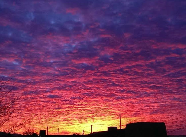 Albuquerque sunrise over the Sandias - Chris Sanchez