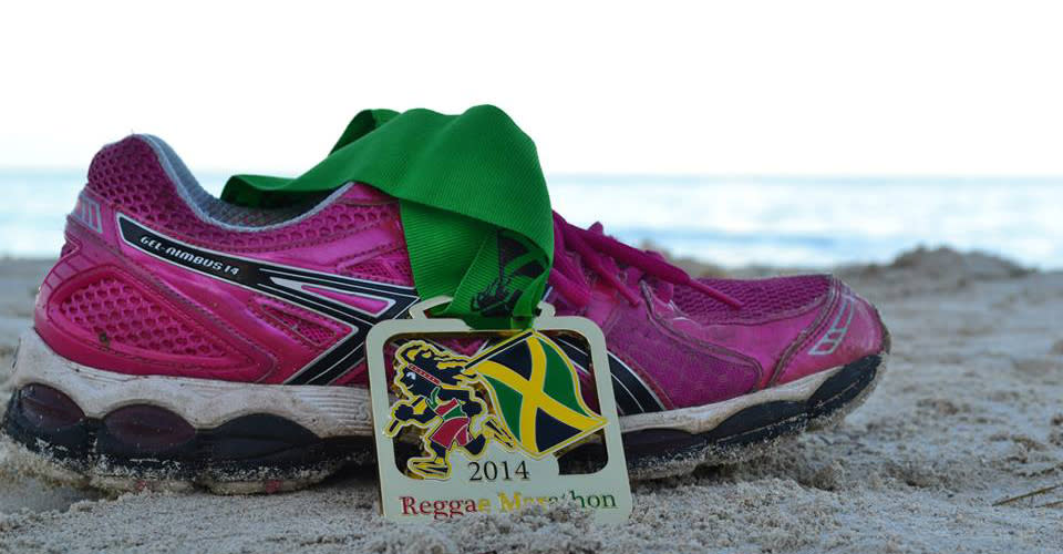 a photo of a running show on the beach of jamaica