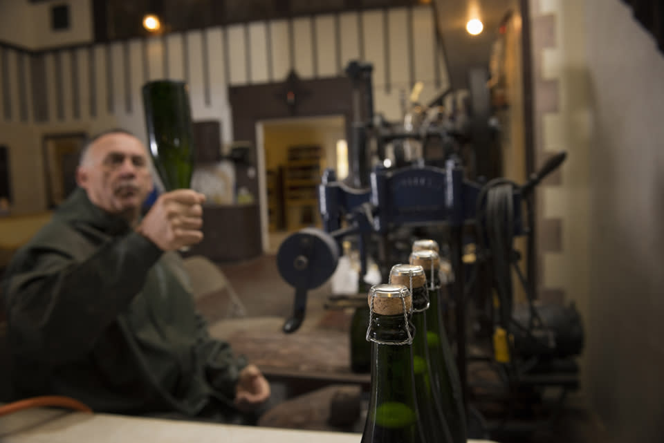 Patrice DeMay Bottling Sparkling Wine at Chateau Renaissance courtesy of Stu Gallagher