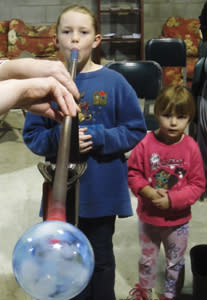 Hands-On Glass Children blowing glass at Hands-On Glass in Steuben