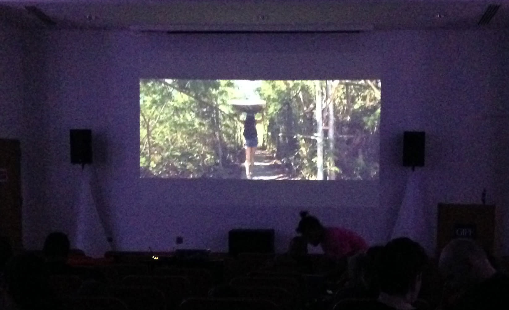 People watch one of the films shown at the UOG Film Festival