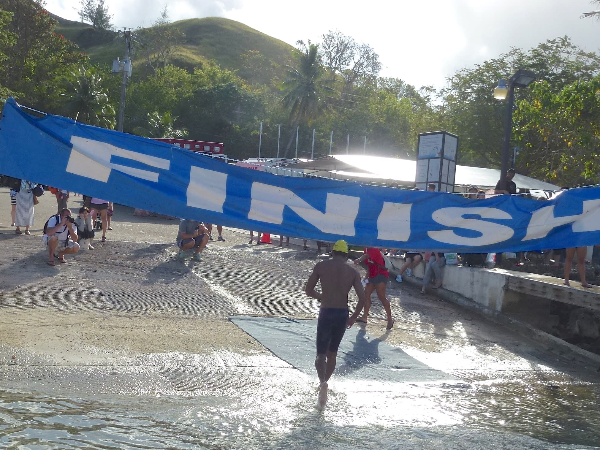 The Finish Line A swimmer crosses the finish line.