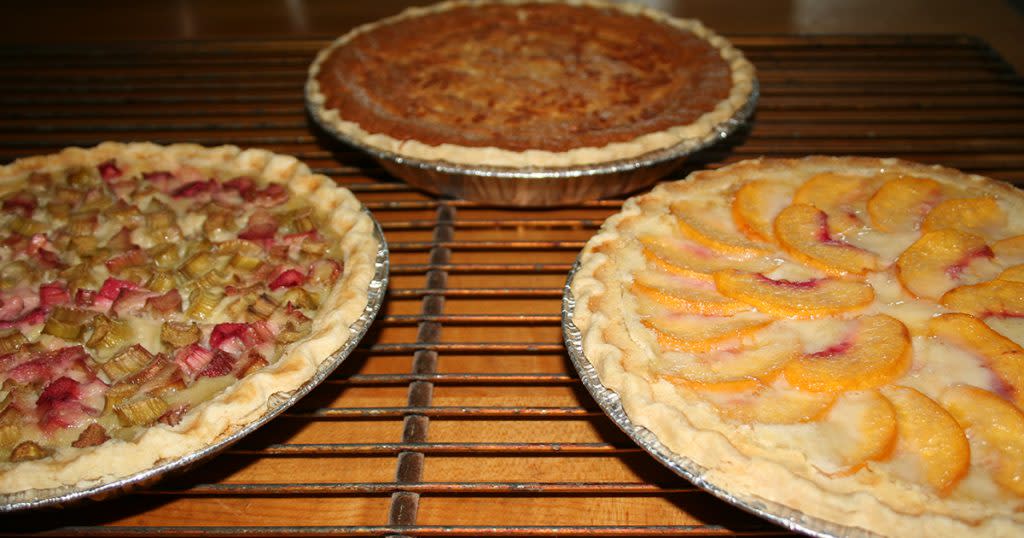 Three pies sit on a rack at Country Lane Bakery in Middlebury, Indiana