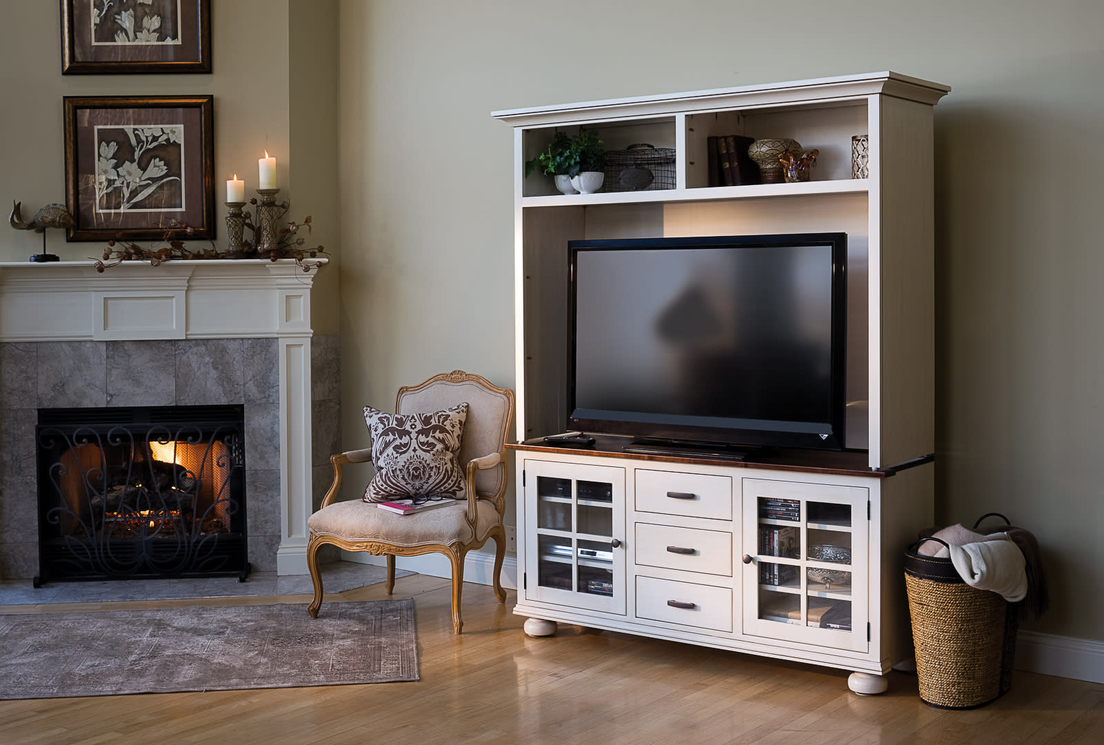 A living room with a fireplace furnished by Homestyle Furniture in Nappanee, IN.