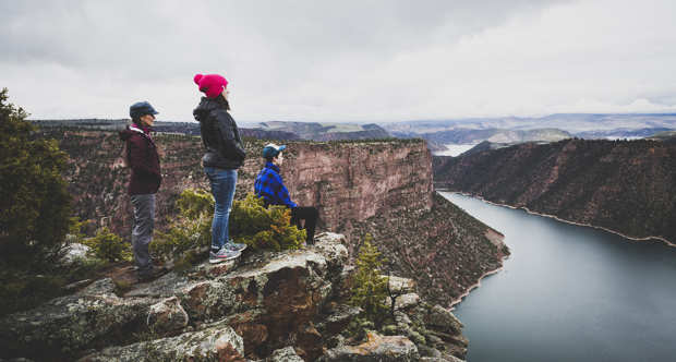 A family takes in the view from the Canyon Rim Trail, Flaming Gorge, Utah.