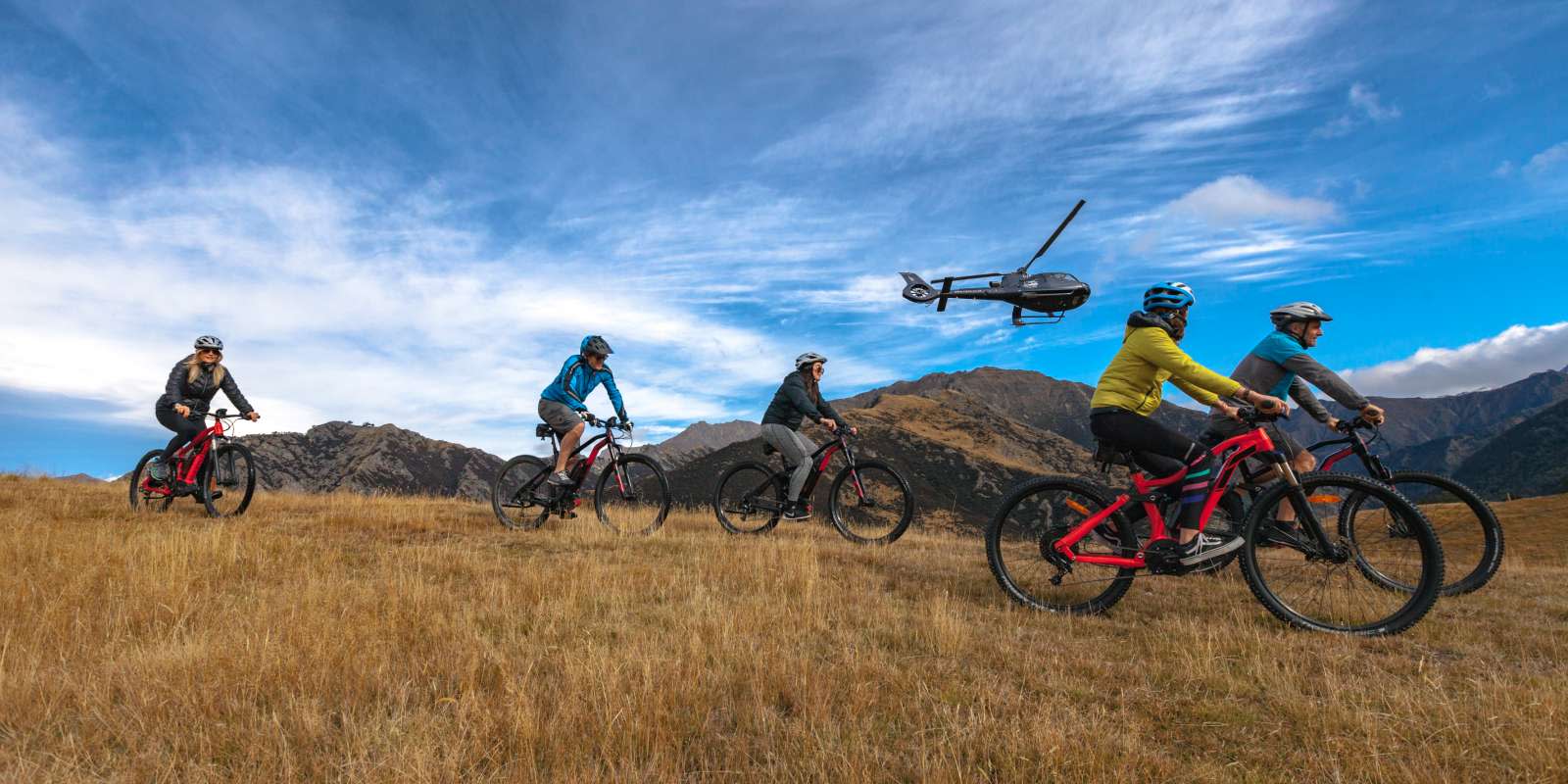 join a heli-ebiking adventure combining the thrill of a helicopter ride with riding in a high country farm