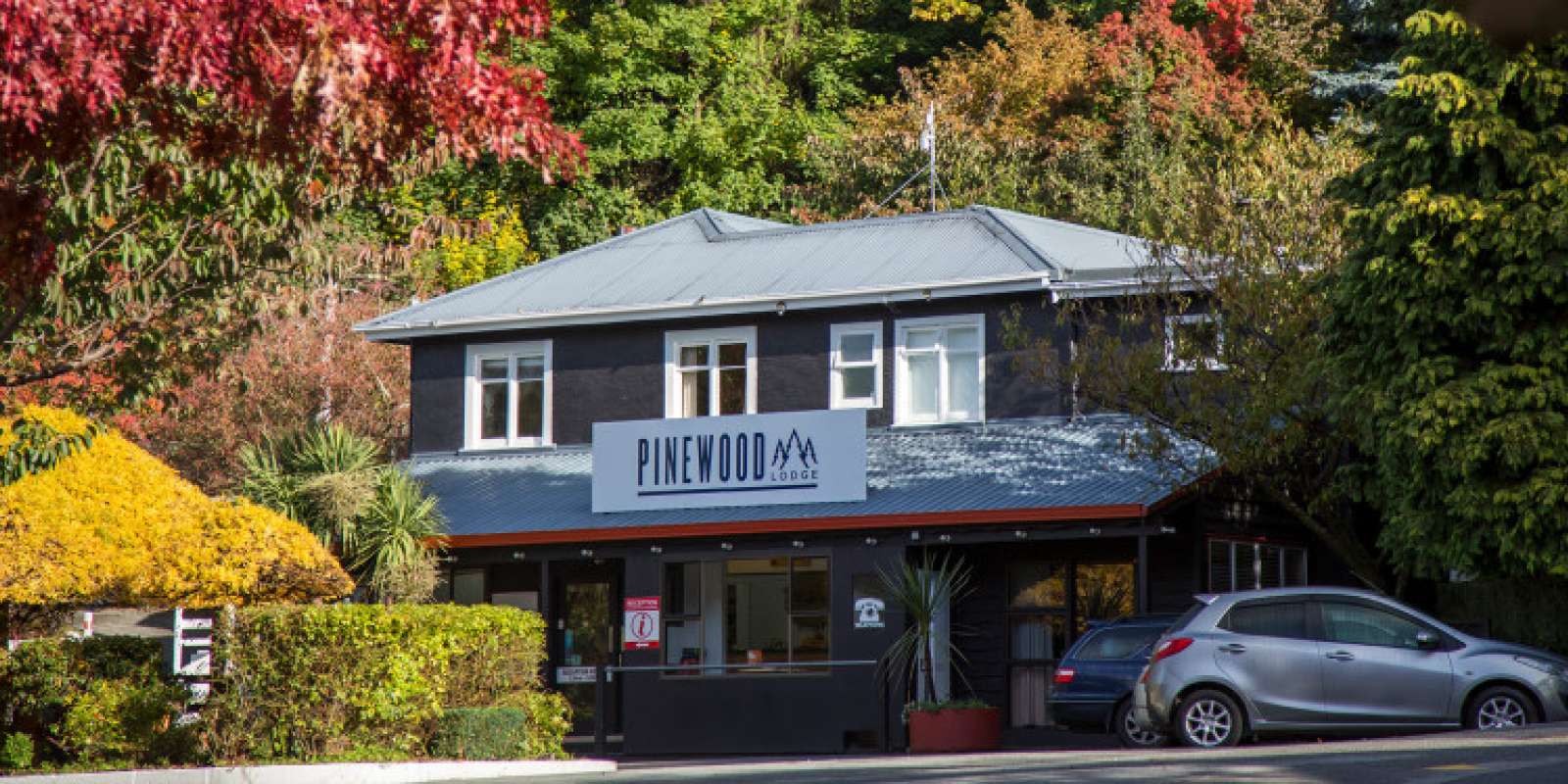 Pinewood Lodge Exterior and Reception in Autumn