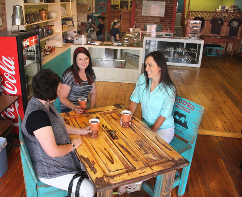 Women enjoy drinks at a Panguitch Utah coffee shop and bakery.  