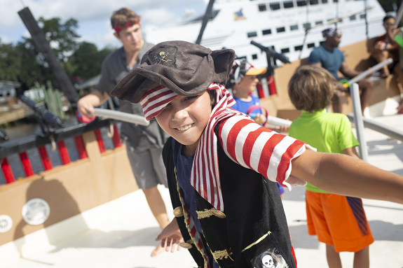 Boy dressed as pirate at Blackbeard's Pirate Cruise/ 