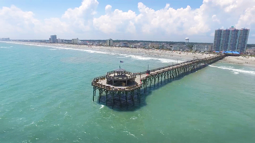 Take an early morning stroll to the Cherry Grove Fishing Pier.