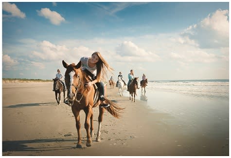 Ride horses on the beach at Inlet Point Plantation. 