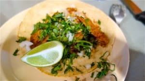 Fish taco Mexican style, cilantro and lime