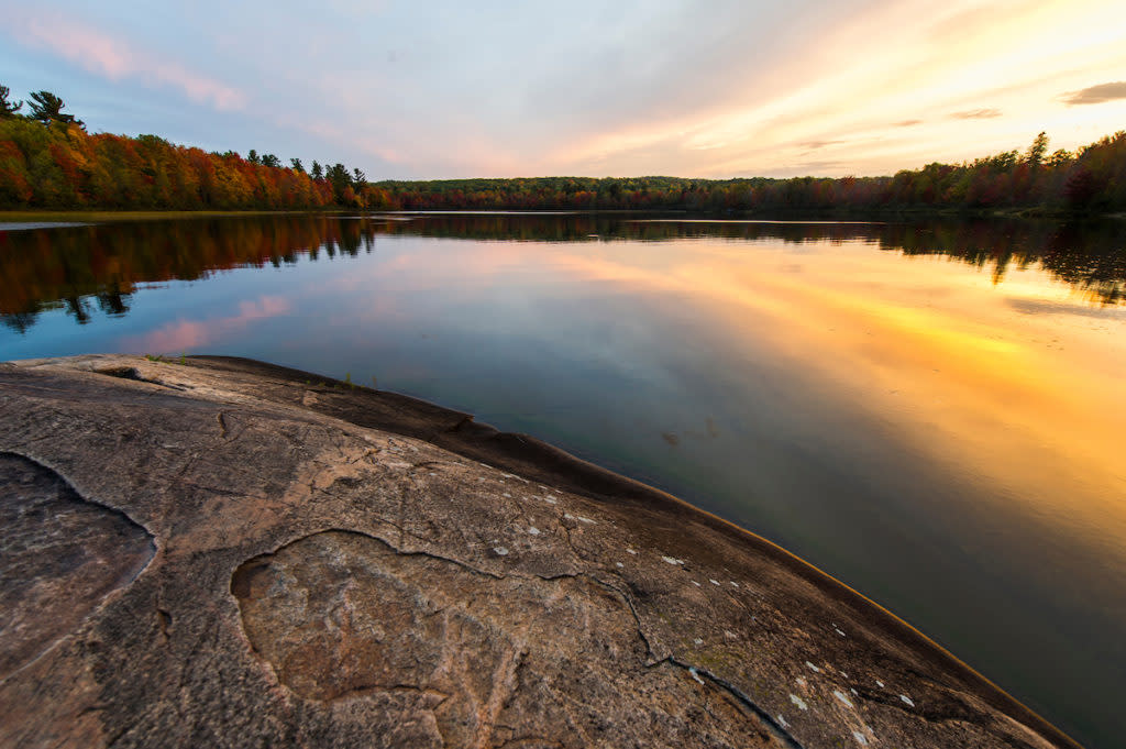 Dusk over Harlow Lake in autumn fall color near Marquette, Michigan on Michigan's Upper Peninsula.