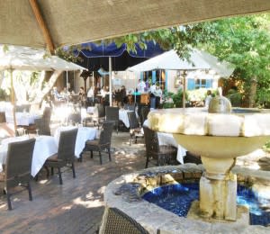 The green leafy courtyard at La Casa Sena is a thing of beauty — and so is the food.