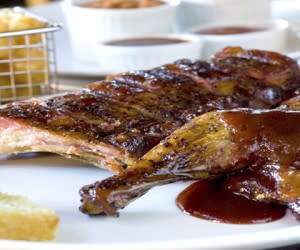 Eat in or take-out:, Either way the Ranch House BBQ is smokin’ good. (Photo Credit: The Ranch House)