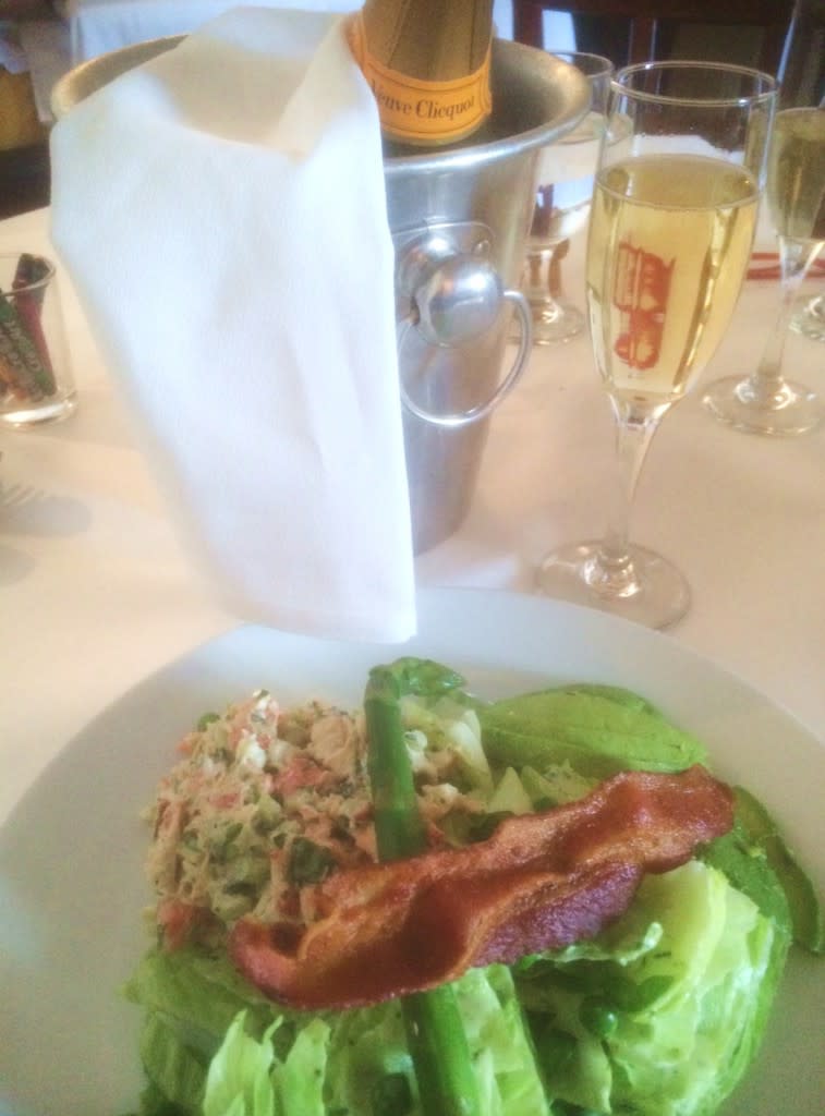 Applewood-smoked bacon is a special surprise on Santacafe’s Maine Lobster Salad.