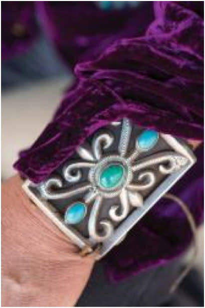 A ketoh, a bow guard worn to protect the archer from the bowstring, also serves as a beautiful bejeweled ornament. (Photo Credit: Kitty Leaken, Courtesy of the Museum of Indian Arts and Culture/Laboratory of Anthropology)