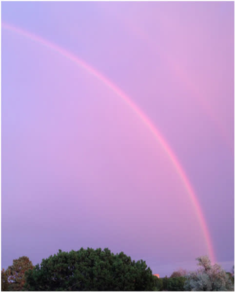 In Santa Fe, rainbows and sunsets do paint the sky at the same time!
