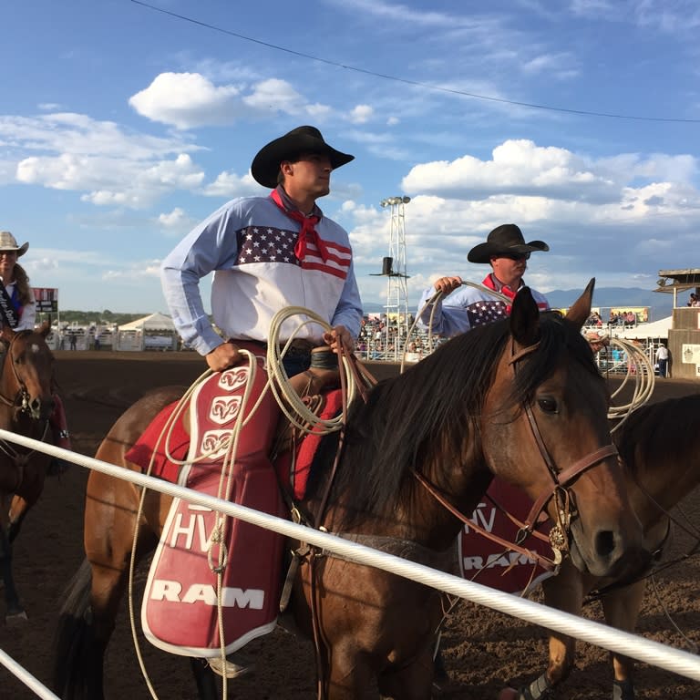Rodeo participants line up in the arena before the rodeo. (Photo courtesy of TOURISM Santa Fe)