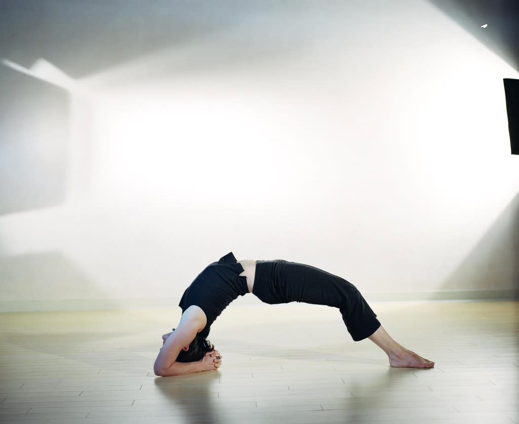 Want to strengthen your back muscles? A Chakrasana yoga pose will help you. (Photo courtesy of Body of Santa Fe)