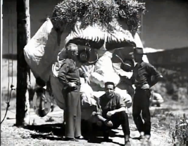 Creator Will Schuster in front of the Zozobra head. (Photo courtesy of New Mexico Museum Art Library and Archives, 1949)