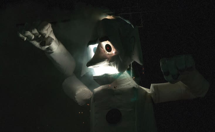 A 1930's looking Zozobra catches fire in last year's burning at Fort Marcy Park. (Photo courtesy of Eddie Moore, The Albuquerque Journal)