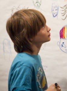 boy and drawings