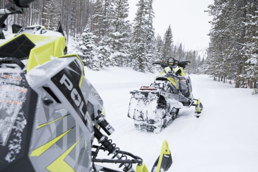 Albany Lodge guide snowmobiles