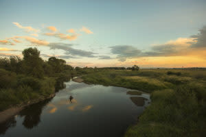 Locals favorite fishing spot The Laramie River along the Laramie Greenbelt