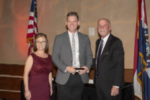 Jeff Houghton (center) received the Spotlight Award.