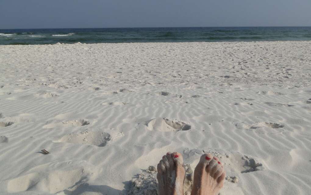 toes in the sand on Perdido Key