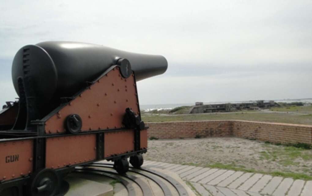 Though Fort Pickens is nestled on soft, white sand, it wears a somber mood.