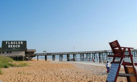 Enjoy eclectic shops, surfing, a classic fishing pier and free access to the beach at Flagler Beach.