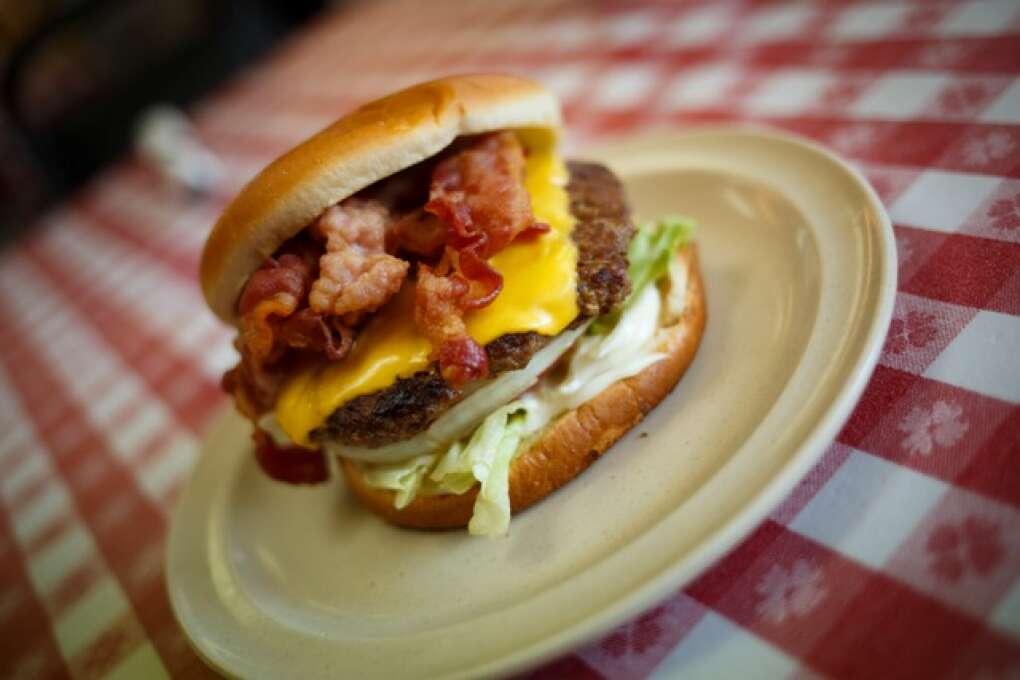 Pioneer Restaurant menu includes a bacon cheeseburger with fresh lettuce, tomato and onion in Zolfo Springs, Florida on March 2, 2015. VISIT FLORIDA/Scott Audette
